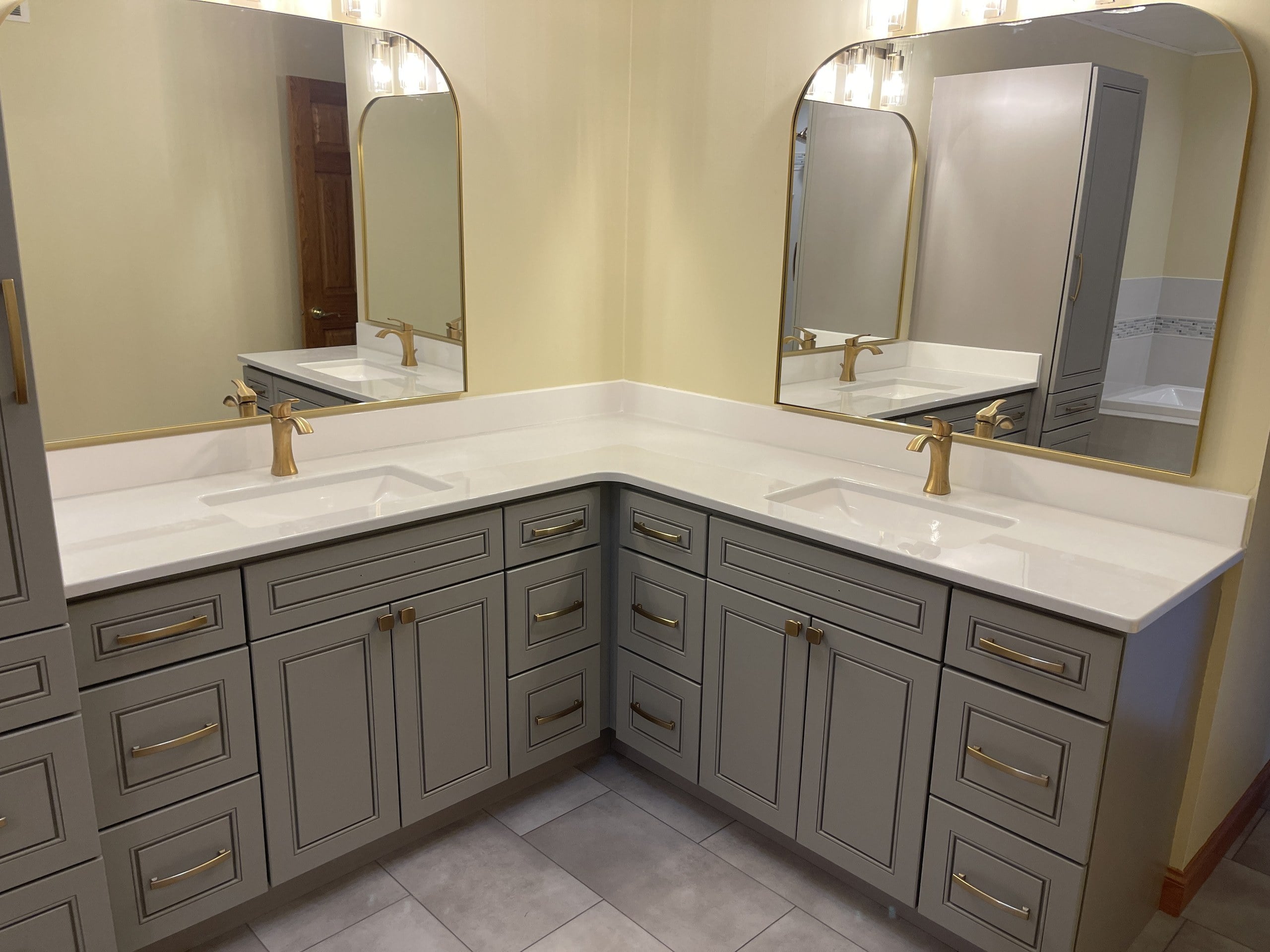 Both mirrors hung and every cabinet pull installed, completed, Hastings handyman services