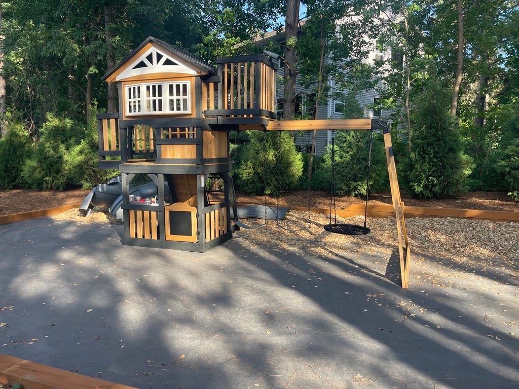 Completed playset with nest swing — Hastings handyman services