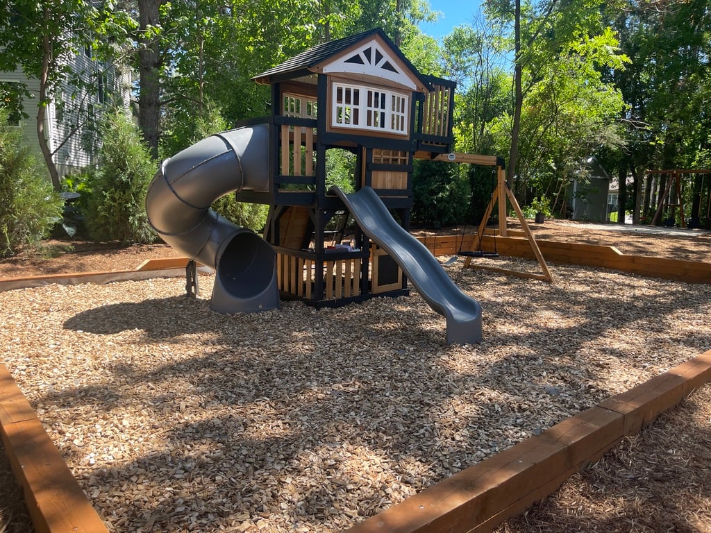 2-story playset with nest swing assembled — Hastings handyman — Bedrock Home and Property